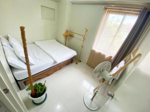 QFandZ Baguio Homestay at BRENTHILL Condominium客房内的一张或多张床位