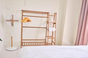QFandZ Baguio Homestay at BRENTHILL Condominium客房内的一张或多张床位