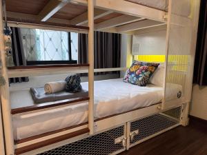 Ein Bett oder Betten in einem Zimmer der Unterkunft Chiza hostel Chiangmai