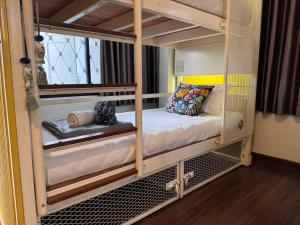Ein Bett oder Betten in einem Zimmer der Unterkunft Chiza hostel Chiangmai
