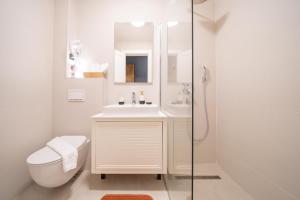 Koupelna v ubytování Invictus Hotel