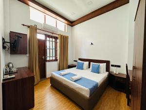 Ένα ή περισσότερα κρεβάτια σε δωμάτιο στο Moi Ella by DBI