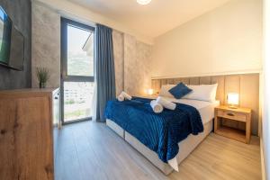 Postel nebo postele na pokoji v ubytování Invictus Hotel