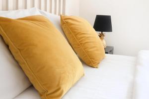 Patch House Glengarriff tesisinde bir odada yatak veya yataklar