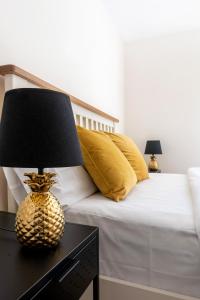 Patch House Glengarriff tesisinde bir odada yatak veya yataklar