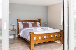 Patch House Glengarriff tesisinde bir odada yatak veya yataklar