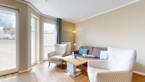 Posezení v ubytování strandnahe FeWo mit Balkon,Residenz Bel Vital 15