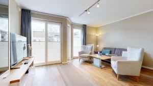 Posezení v ubytování strandnahe FeWo mit Balkon,Residenz Bel Vital 15