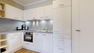 Kuchyň nebo kuchyňský kout v ubytování strandnahe FeWo mit Balkon,Residenz Bel Vital 15