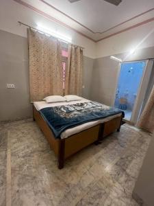 Fotografie z fotogalerie ubytování Devotee Apartment Behind Iskcon. v destinaci Vrindavan