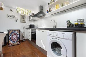 A kitchen or kitchenette at Loft la Matanza