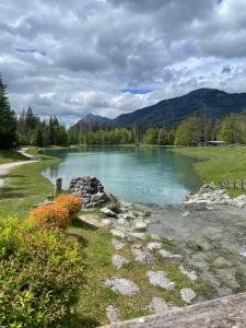 a river with mountains in the background at Studio Samoëns 1600 station de ski in Samoëns