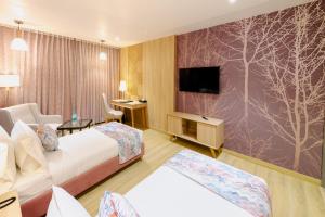 Signature Hotel TV 또는 엔터테인먼트 센터