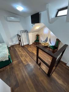 an overhead view of a room with a bed and a table at Casa Romana in Bucharest