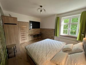 Katil atau katil-katil dalam bilik di Apartmán Rosa