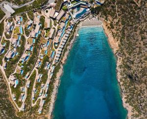 an aerial view of a body of water at Daios Cove in Agios Nikolaos