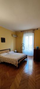 Postel nebo postele na pokoji v ubytování SCALETTE ROOM