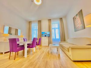 Televízia a/alebo spoločenská miestnosť v ubytovaní Steiner Residences Vienna Taborstrasse