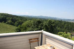 a balcony with a view of a mountain at Hotel Garni am Seggauberg in Leibnitz