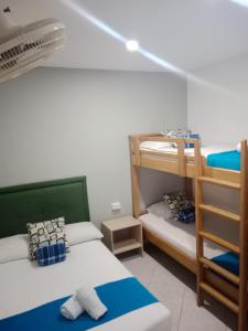 Postel nebo postele na pokoji v ubytování Hotel El Deportista