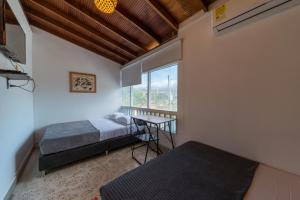 Postel nebo postele na pokoji v ubytování Living Hotel
