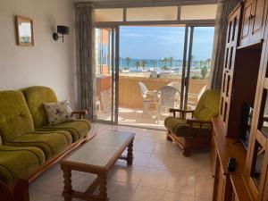 A seating area at SUN and BEACH lovers apartemento 14119