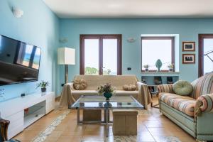 Гостиная зона в Villa Rosa sul mare