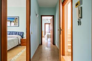 Кровать или кровати в номере Villa Rosa sul mare