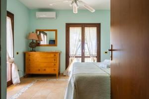 Кровать или кровати в номере Villa Rosa sul mare