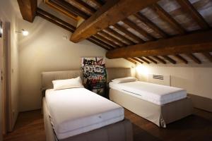 Postel nebo postele na pokoji v ubytování Podere I Poggi by Great Stays + 69 fotografií