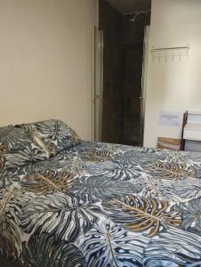Postel nebo postele na pokoji v ubytování CASA COLIVING avec chambre salle de bain individuelles privatives