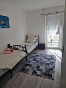 Postel nebo postele na pokoji v ubytování Gasthaus Weigl