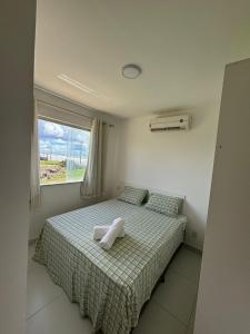 Postel nebo postele na pokoji v ubytování VIRASSOL Praia Hotel