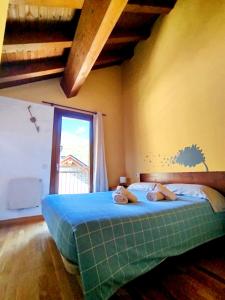 Ein Bett oder Betten in einem Zimmer der Unterkunft Apartaments Sort Pirineus