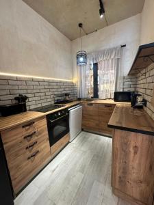 Kuchyň nebo kuchyňský kout v ubytování Grigoleti Dream House