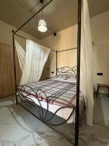 Postel nebo postele na pokoji v ubytování Grigoleti Dream House