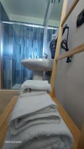 Ένα ή περισσότερα κρεβάτια σε δωμάτιο στο B&B Marisella