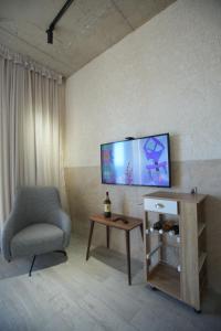 TV a/nebo společenská místnost v ubytování Grigoleti Dream House