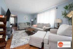 a living room with a couch and a table at Holland Hideaway in Holland