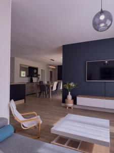 Posezení v ubytování Maison Familiale Moderne avec Grand Jardin à Bommes - Un Havre de Paix pour vos Vacances