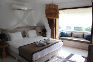 Postel nebo postele na pokoji v ubytování CASA TUANA + 23 fotografií
