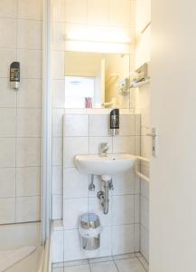 Koupelna v ubytování Gasthaus Traube, Ludwigshafen, Bodensee, Seenah gelegen