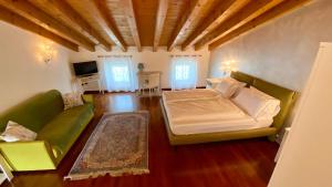 Postel nebo postele na pokoji v ubytování B&B Civico 61