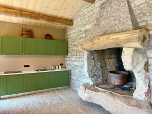Ett kök eller pentry på Chalet I Porsili