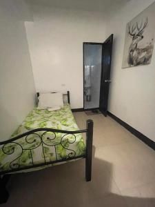 Letto o letti in una camera di Mayon Lodging House