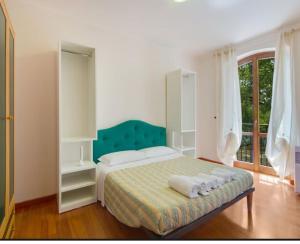 Ліжко або ліжка в номері Villa Serra Alta