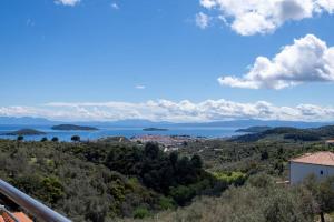 a view of the water and islands in the distance at Koukounaraki Apartment 1 in Skiathos