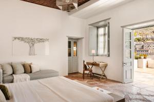 Voodi või voodid majutusasutuse Hydrea Exclusive Hospitality toas