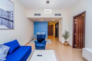 Posezení v ubytování 1 BR Apt, Miracle Garden with RoofTop Pool, King Bed, Gym,100mbps