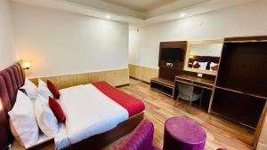 Кровать или кровати в номере Hotel New Ocean